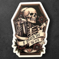 Decorative sticker with a skeleton, urn, and coffee cup on a dark background