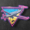 Decorative patch with airplane design and 'Surf the Sky' text on a dark background